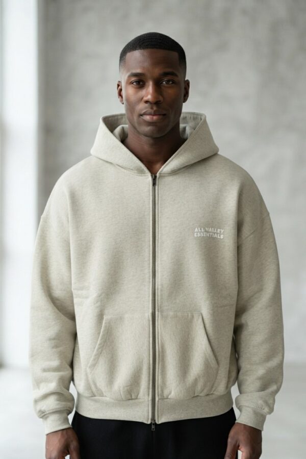 Shop the Essentials 90s Zip-Up Grey Hoodie. Crafted from premium heavy fleece with a relaxed vintage fit and versatile full zipper. Order today!