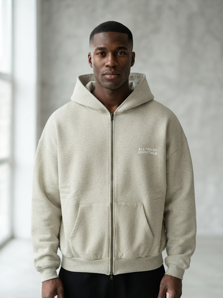 Shop the Essentials 90s Zip-Up Grey Hoodie. Crafted from premium heavy fleece with a relaxed vintage fit and versatile full zipper. Order today! Shop the Essentials 90s Zip-Up Grey Hoodie. Crafted from premium heavy fleece with a relaxed vintage fit and versatile full zipper. Order today!